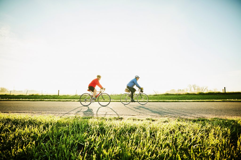 two cyclists on a road